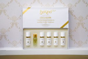 BeKind Pro Cell Glow 7-Day Skin Revival Treatment Kit, open white box holding six small bottles